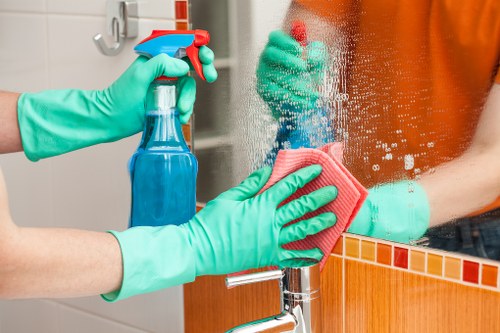 Carpet cleaner preparing equipment safely before a cleaning job
