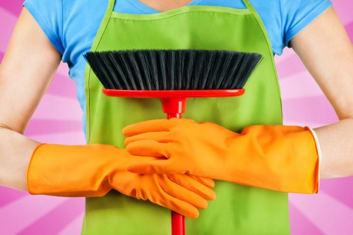 Staff following emergency and hygiene procedures during carpet cleaning
