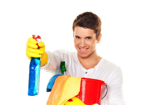 Local carpet cleaners in Locks Bottom inspecting a carpet for stains and wear